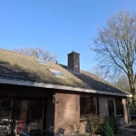 Bestaande schoorsteen waardoor er een nieuw rookkanaal getrokken wordt